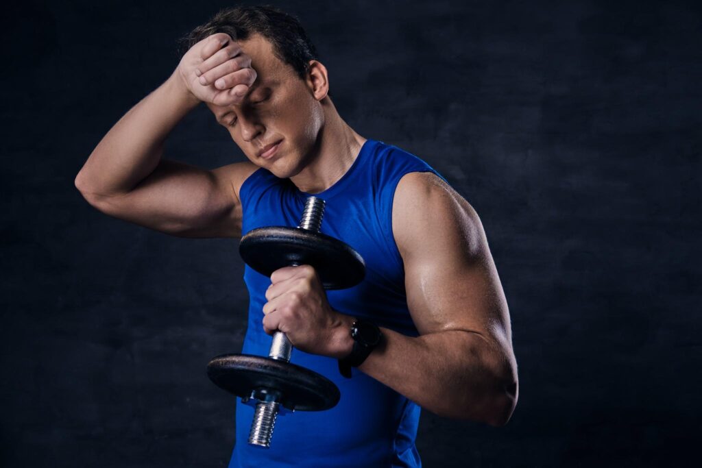 Member performing strength training for fat loss at Face Off Fitness Dubai